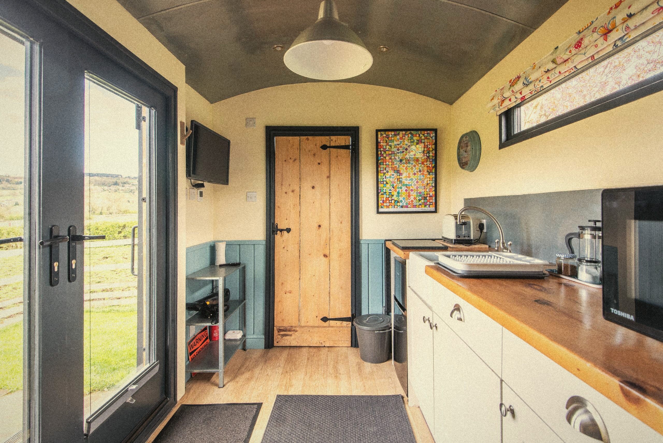 Inside The Carriage looking towards the bathroom door
