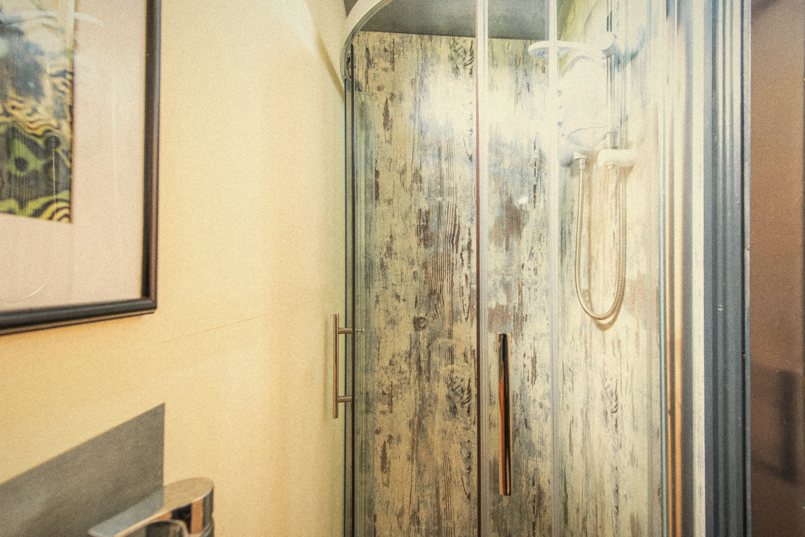 The Carriage shower with timber-effect panels