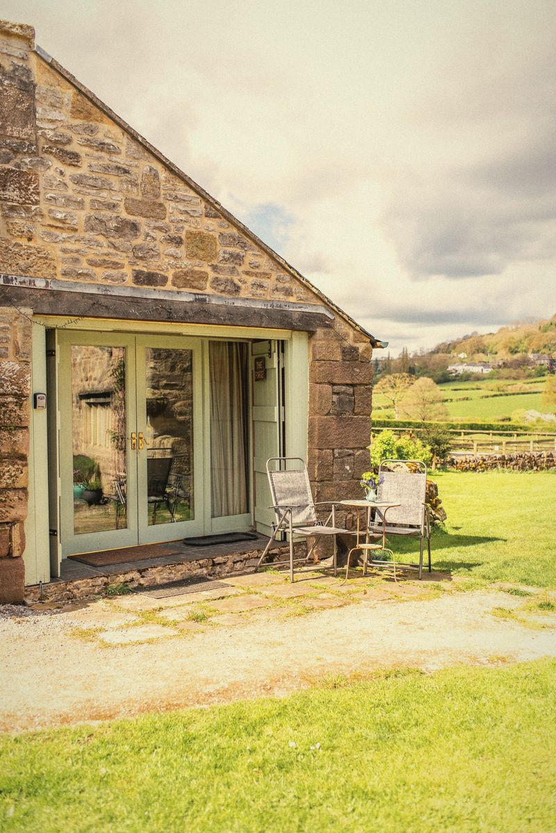 The Forge’s patio doors and patio with table and chairs